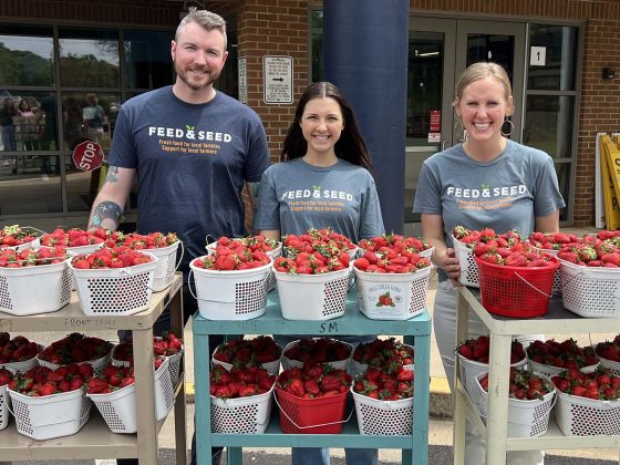 Feed & Seed distributes strawberries during afternoon car line at Alexander Elementary as part of the LFPA program