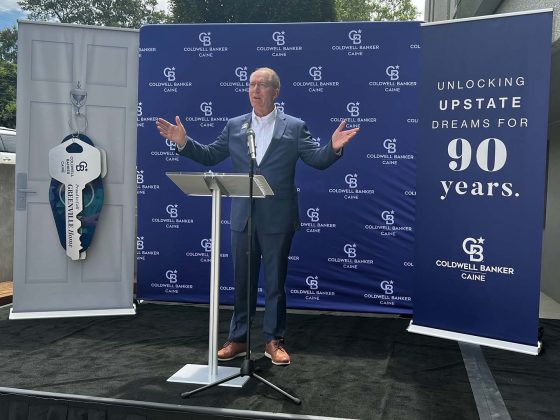 Greenville Mayor Knox White proclaimed Aug. 28, "Caine Day" during a celebration at Coldwell Banker Caine's Greenville office.