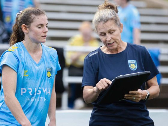 Julie Mackin (left) and coach Julie Carlson.